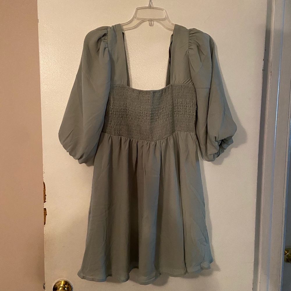 Green smocked mini dress